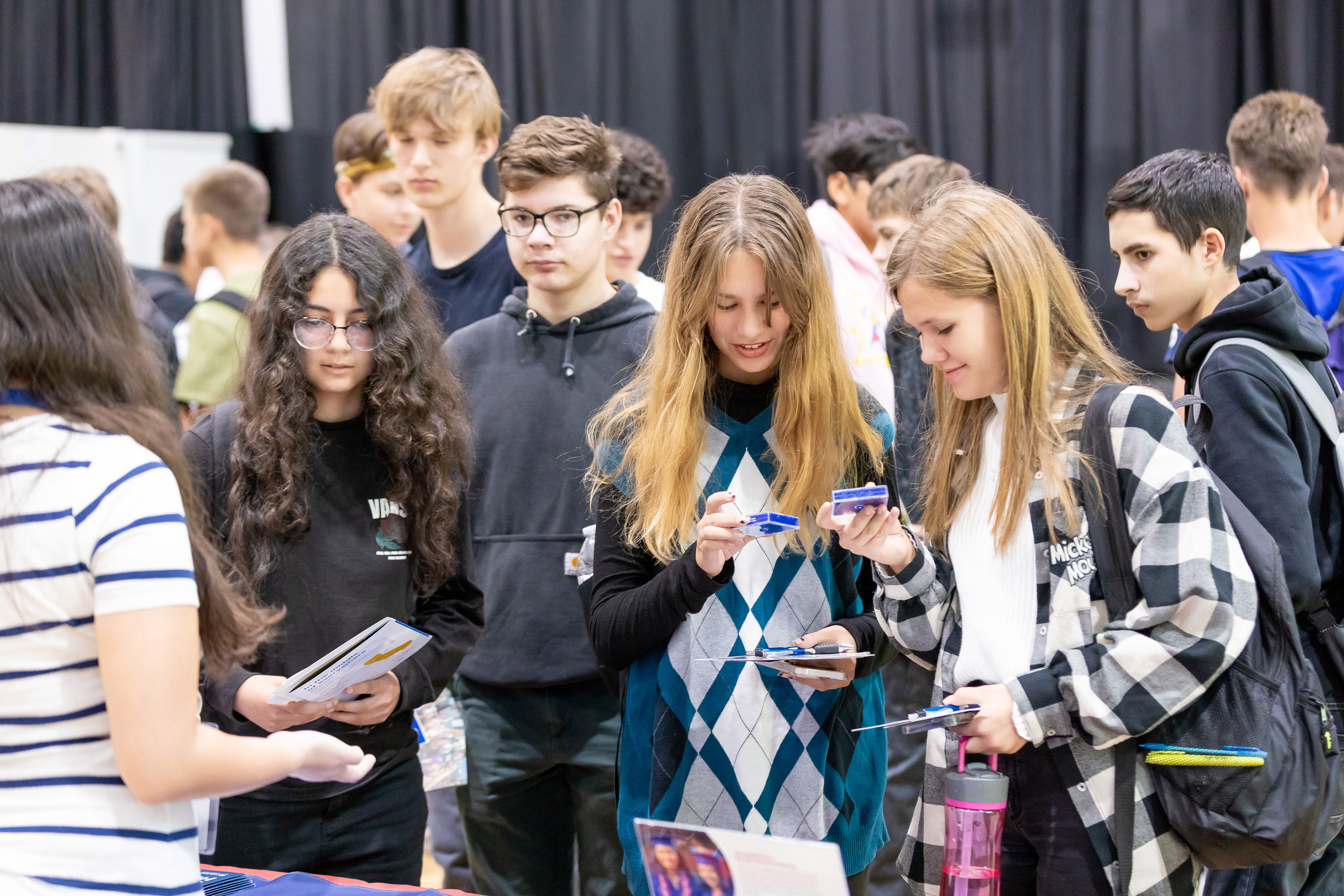 Students reviewing colleges