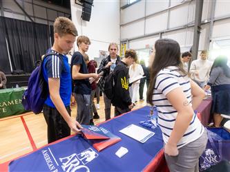 Students speaking with recruiters