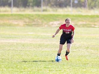 Soccer player in field