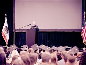 Man presenting at podium