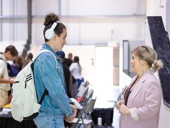 2 women speaking