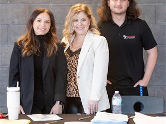 Futures counselors are posed at their table