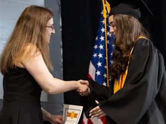 Student shaking hands