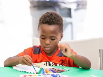 student painting fan 