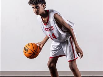 Futures Junior Varsity Basketball #14 dribbling
