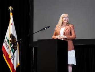 Superintendent speaking at podium
