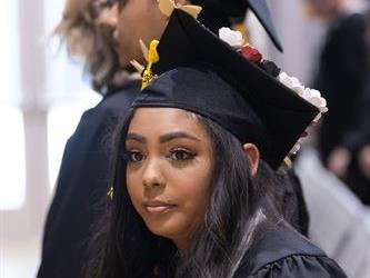 Graduate smiling for camera