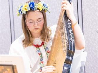 Woman playing musical instrument