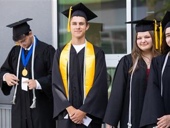 Students in line prepping to walk for graduation
