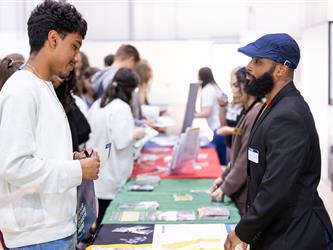 Students speaking with recruiters