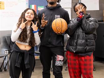3 students are pictured with poses