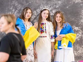 Group of women in blue and yellow