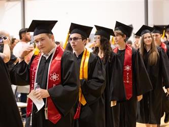 Students walking into gym