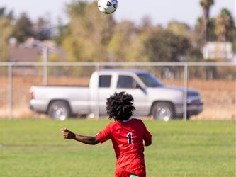 Student attacking the ball