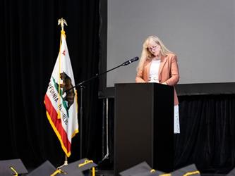 Superintendent speaking at podium