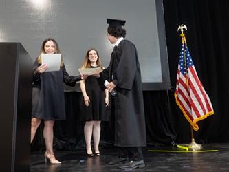 Student receiving award