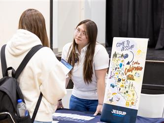 Student talking with recruiter