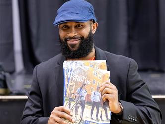 College recruiter holding folder