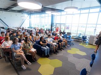 Teacher speaking to parents