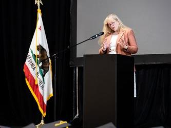 Superintendent speaking at podium