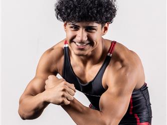 Wrestler flexing his muscles