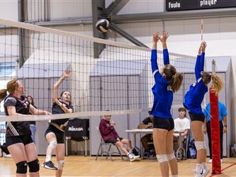 Girls playing volleyball