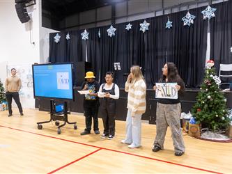 Students speaking to families