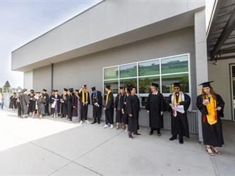 Students in line by gym