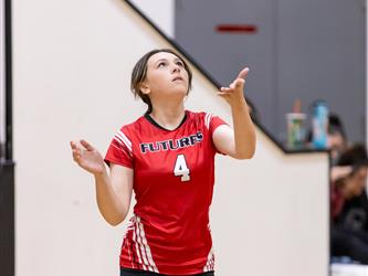 Futures Girls Volleyball team serving