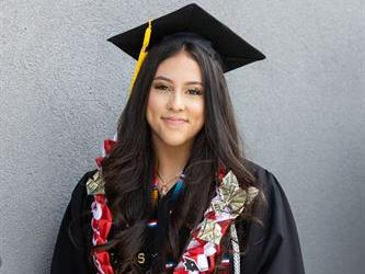 Graduate smiling for camera