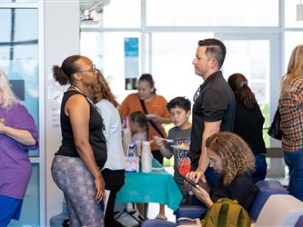Staff speaking with families