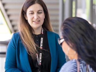 Teacher speaking to parent