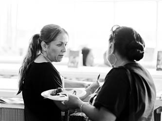 Teacher speaking to parent
