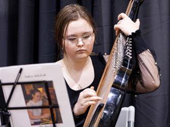 Student playing instrument