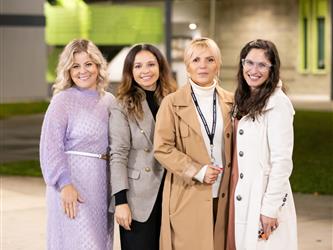 4 women in line for photo