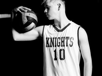 Volleyball player posing in black and white