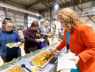 Person helping to serve food