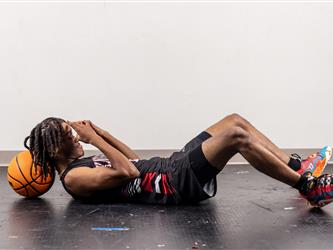 Futures Varsity Basketball Player #2 laying down