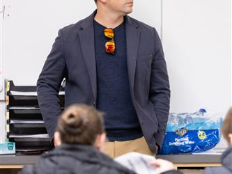 Principal Vicente is pictured in front of the classroom