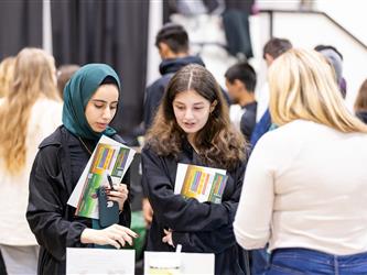 Students speaking with recruiters