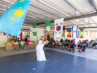 student doing traditional dance in cultural dress