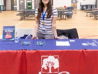 Recruiter at table in gym