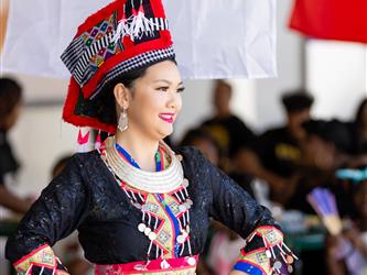 2 students dancing in cultural attire