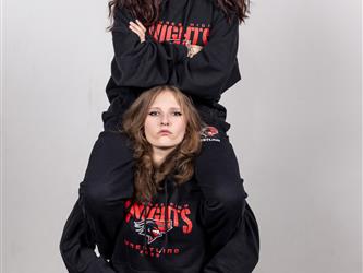 Two wrestling teammates posing