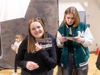 Student smiling at camera