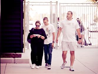 Students and staff walking in hall