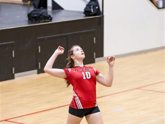Futures Girls Volleyball team serving