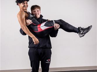 Two teammates posing together