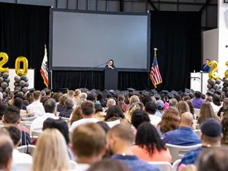 Woman presenting at podium