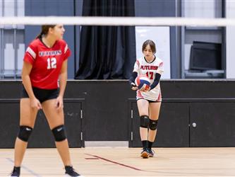 Futures Girls Volleyball team servng